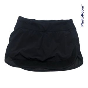 Black Lululemon Skirt with bottom mesh detail. Size 6.